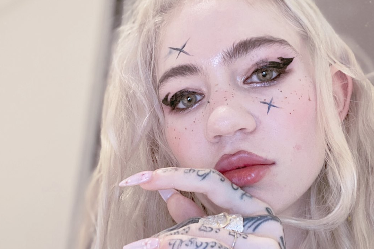 Grimes Gets Wild New Tattoo, Plans to Become 'Post-Human'  